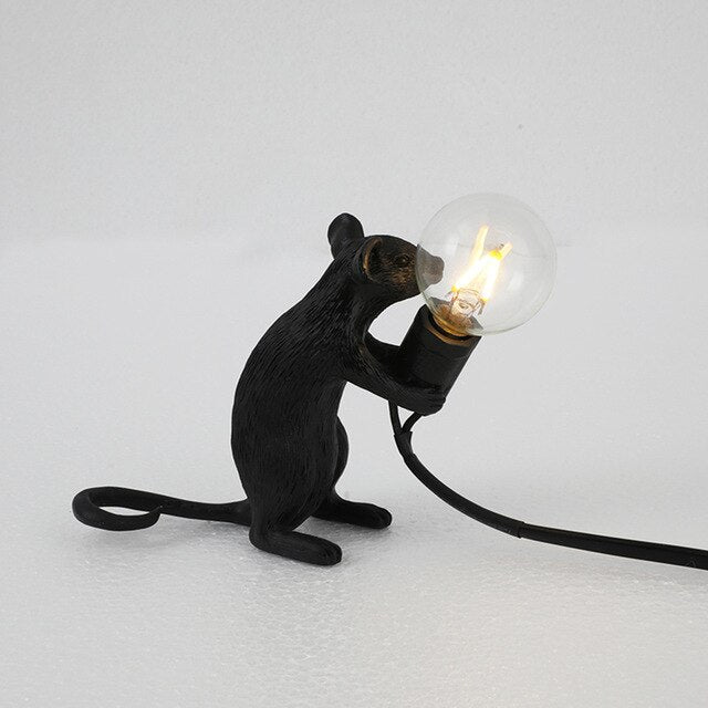 This modern lamp in minimalistic nordic style in a shape of a mouse will become a special decoration in your interior. It could also be an original beautiful gift!