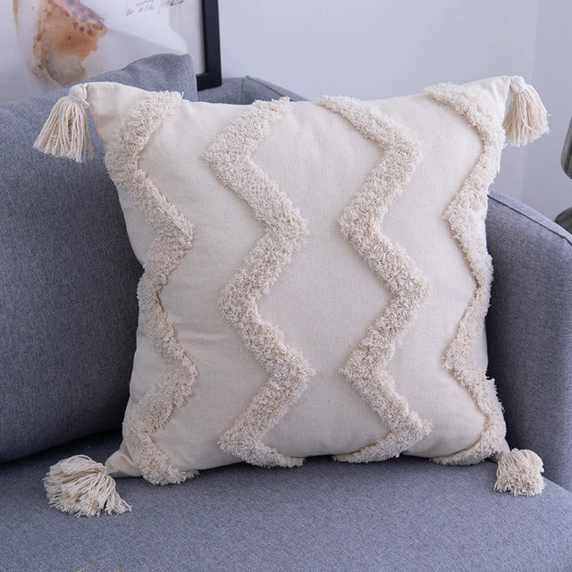 beige decorative couch pillow